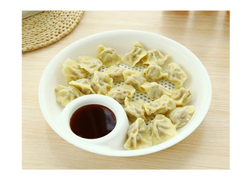 蘸醋吃饺子